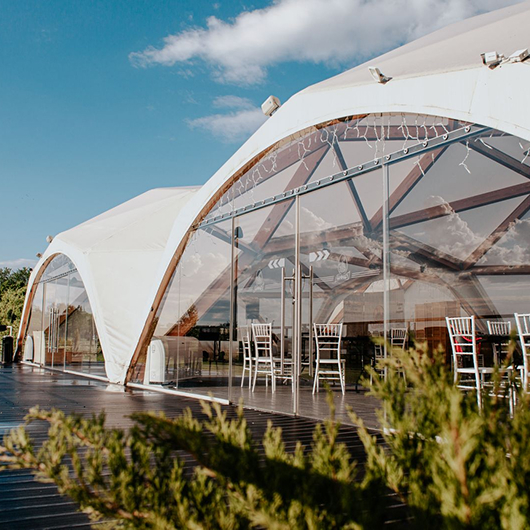 Wooden tents from WODDOMES offer natural aesthetics, reliability, and quick deployment for any project